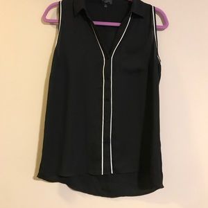 Collared sleeveless button down blouse